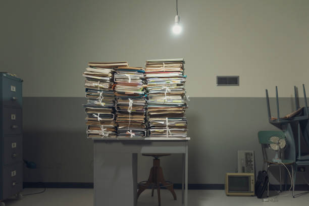 istock Piles of paperwork on the desk 1185016288