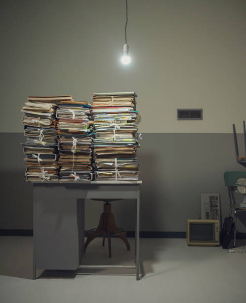 istock Piles of paperwork on the desk 1185016316