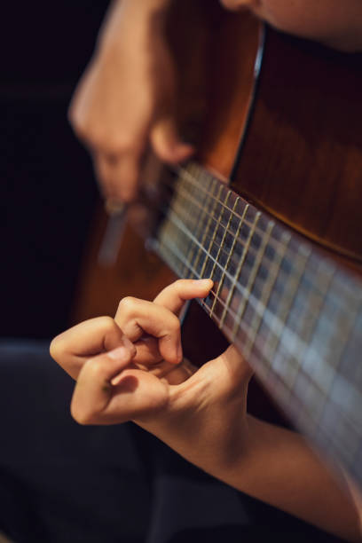 istock Musician playing classic guitar 1185017996