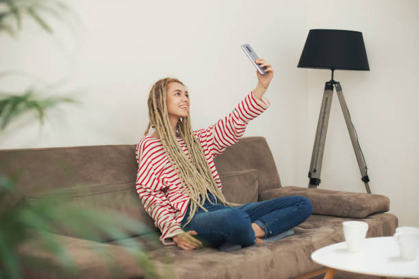 istock Girl taking a selfie 1185021507