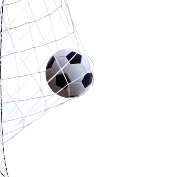 istock Studio shot moving soccer ball in goal net isolated on white 1185022449