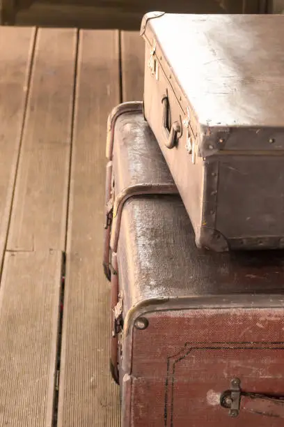 old vintage brown leather suitcase closeup vertical photo travel design
