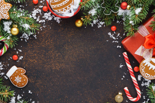 istock Christmas background with gift box, cookies and Xmas tree. 1185025183