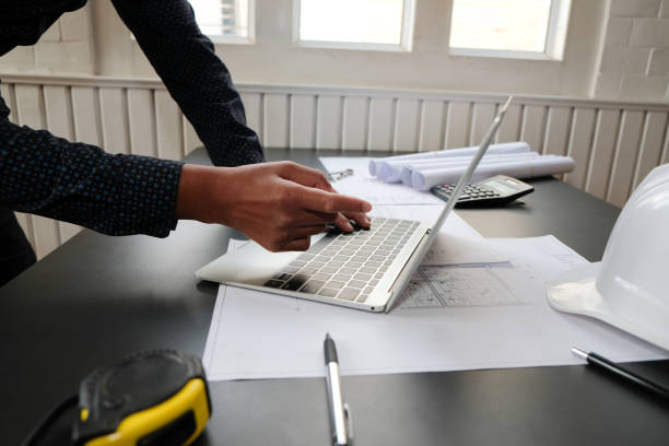 istock architect engineer working on house blueprint of real estate project. building construction concept 1185027616