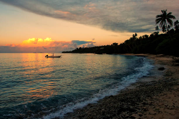Sandy beach on Taveuni Island at sunset, Fiji. Taveuni is the third largest island in Fiji.
