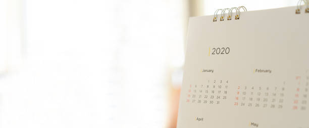 istock close up side view on white  calendar 2020 month schedule background to make appointment meeting or manage timetable each day for planning work and life concept 1185031741