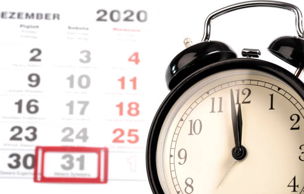 istock New Year calendar and alarm clock 1185033986
