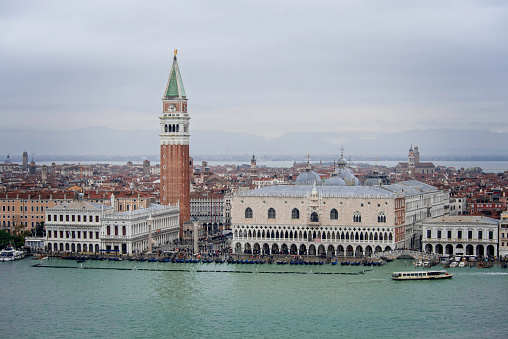 Venice from the tower at San Giorgio Maggiore, showing the famous approach by sea to the the two columns, the Piazzetta, St Mark's Square, the Campanile and the Doge's Palace. Taken during the acqua alta (high tide) which comes each autumn, flooding the city worse each year.