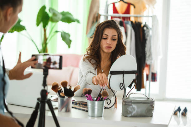 istock Filming a live stream on applying make-up 1185040690