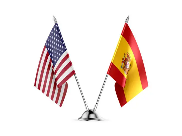 Photo of Desk flags, United States  America  and Spain, isolated on white background. 3d image