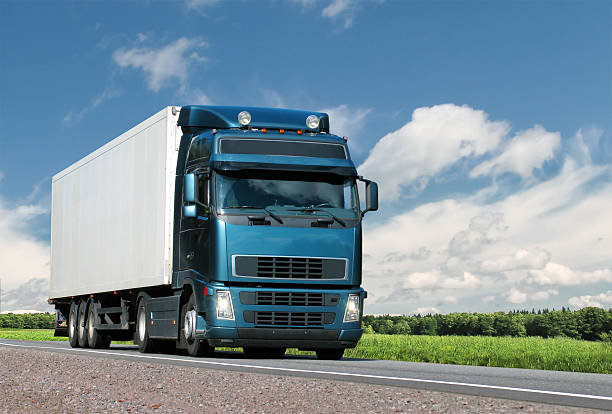 istock truck on summer country highway 118504552