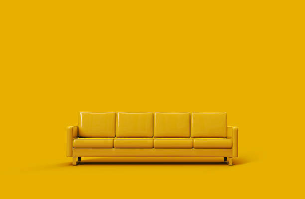 istock Yellow leather sofa isolated on yellow background. 3d rendering 1185051178