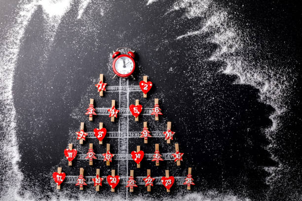 Christmas advent calendar with gifts and decor hanging indoors, closeup. Space for text