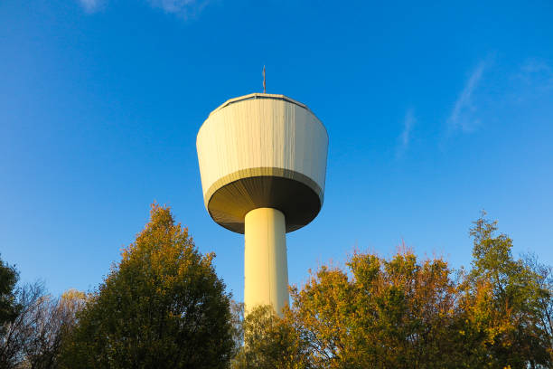 istock View on isolated 55 meters high water tower through against blue sky. Tower function shaft reservoir for 2000 cubic meters of water. Viersen, Dülken (Duelken), Germany 1185054675
