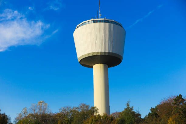 istock View on isolated 55 meters high water tower through against blue sky. Tower function shaft reservoir for 2000 cubic meters of water. Viersen, Dülken (Duelken), Germany 1185054738