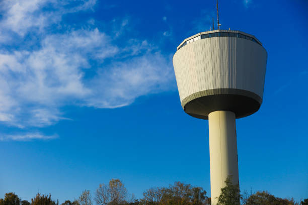 istock View on isolated 55 meters high water tower through against blue sky. Tower function shaft reservoir for 2000 cubic meters of water. Viersen, Dülken (Duelken), Germany 1185054744