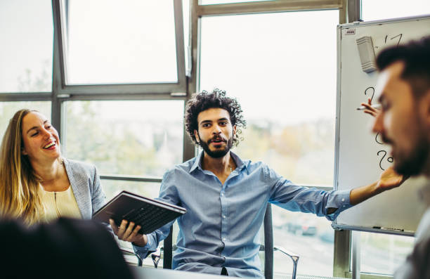 istock Business people discussing in the board room 1185056185