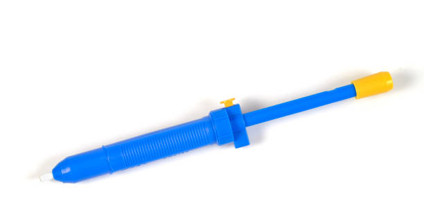 istock Solder sucker, Soldering vacuum pump isolated on white . 1185062839