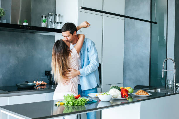istock young couple cooking a vegetarian breakfast 1185063600