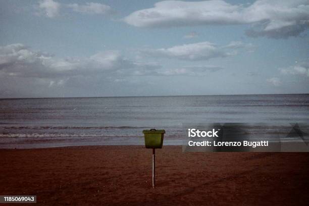 A Trash Can In The Beach Stock Photo - Download Image Now - Beach, Coastline, Color Image
