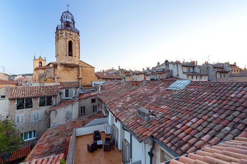 Aerial view of the old tiled roofs of the old city at dawn. France. Aix-en-Provence.
