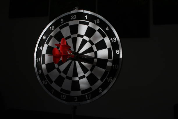 istock trying to hit the dartboard 1185070970