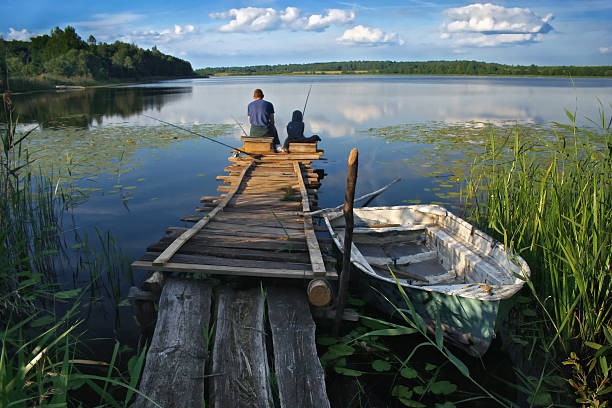 istock Fisherman on the lake 118507417