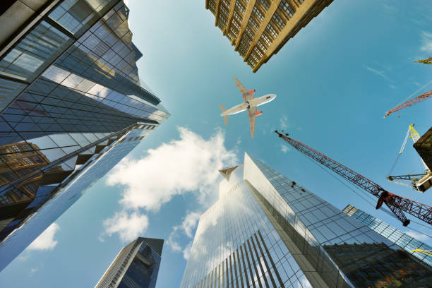 Airplane flying over skyscrapers, Hudson Yards, Manhattan, New York City