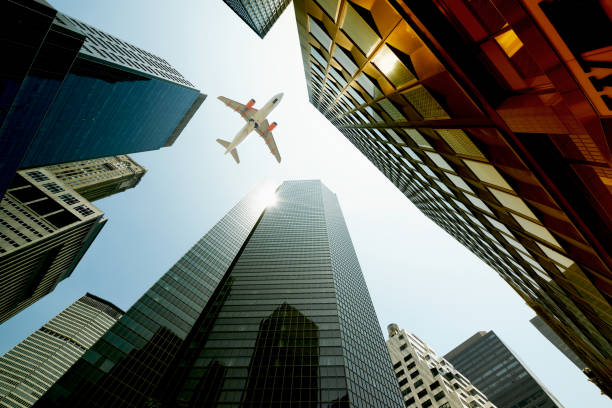 istock Airplane flying over skyscrapers, Lower Manhattan, NYC. 1185074760