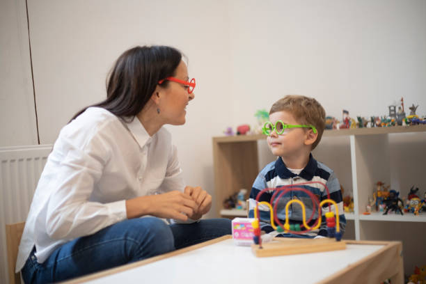 istock Little boy and a therapist having a play therapy class 1185079018