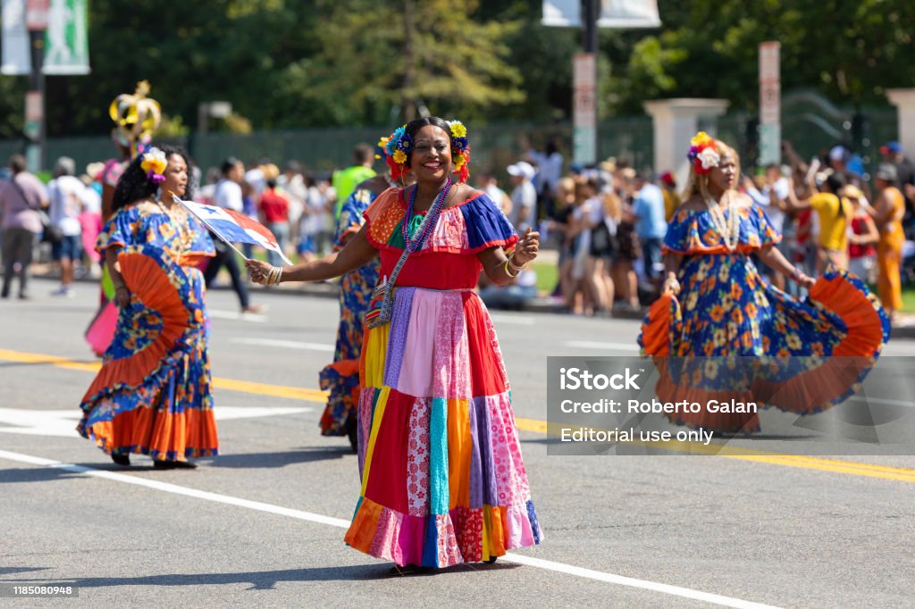 Fiesta DC Washington DC, USA - September 21, 2019: The Fiesta DC, Women wearing panamanian traditional clothing, dancing during the parade Panama Stock Photo