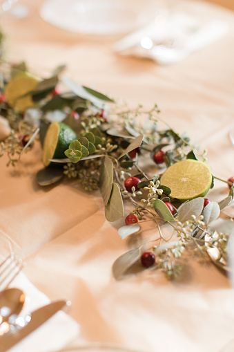 Thanksgiving dinner table decorations. Vintage china, drink ware and silverware.