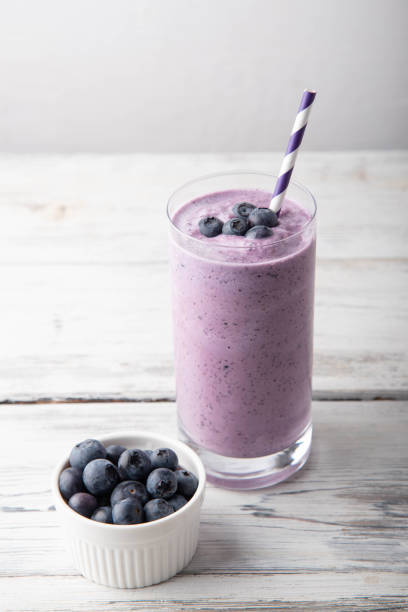 istock blueberry smoothie on white background 1185085651