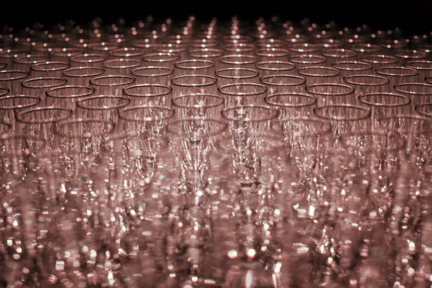 Rows of empty glasses of champagne background. Glasses background