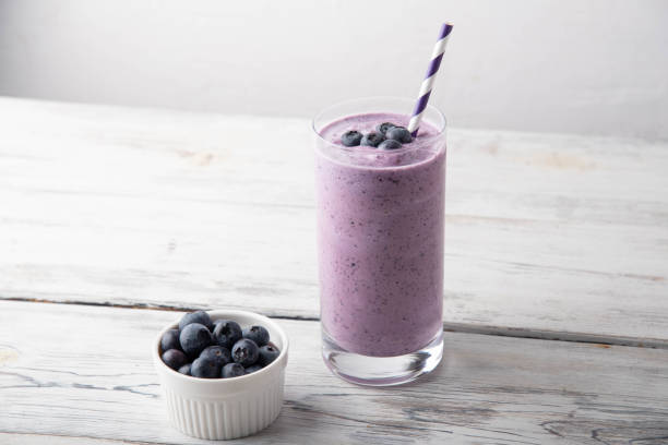 istock blueberry smoothie on white background 1185085960