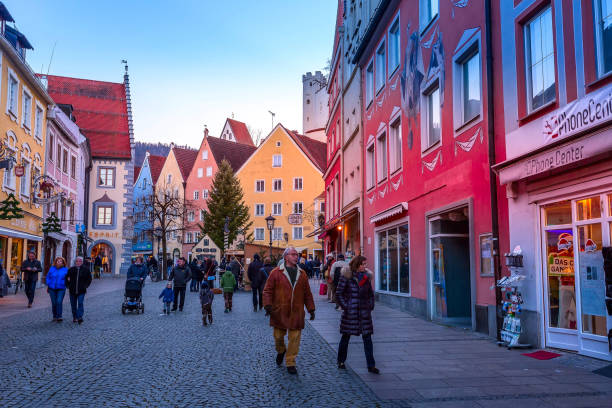 Fussen, Germany - December 27, 2016: Town street view at Christmas time, traditional bavarian houses and decorations, Bavaria