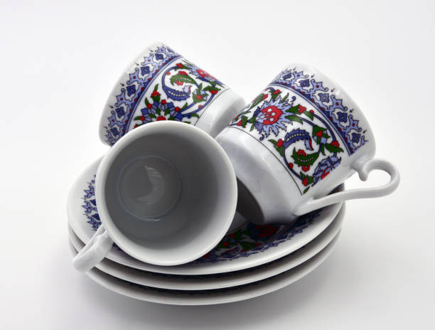 istock Plates and cups on a white background. Turkish coffee set. Isolated. Side view. Close-up. 1185089142