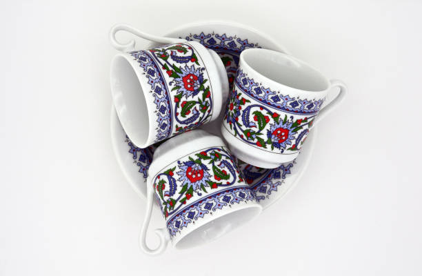 istock Plates and cups on a white background. Turkish coffee set. Isolated. View from above. 1185089183