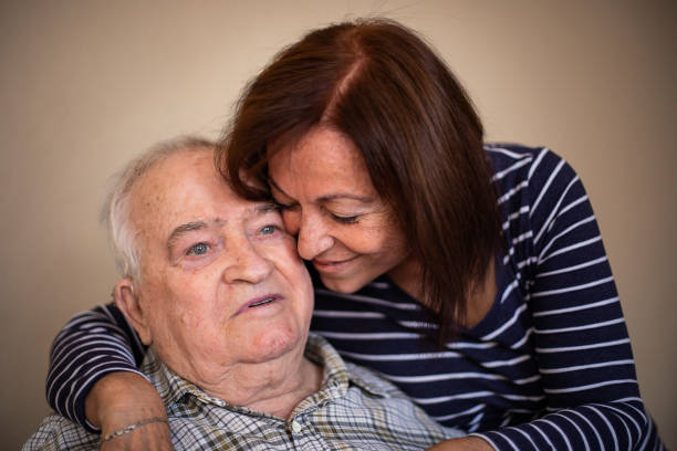 istock A grandmother hugs her elderly father 1185089217
