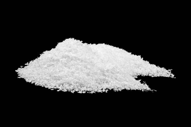 istock Pile of white snow on a black background 1185093559