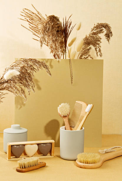 istock Background with autumn plants and zero waste bathroom utils in pastel colors. 1185101694