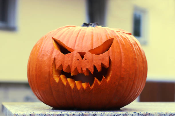 istock Halloween pumpkin with a spooky face 1185102635