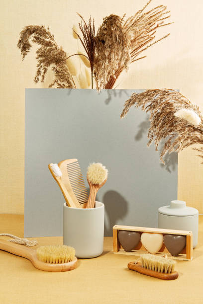 istock Background with autumn plants and zero waste bathroom utils in pastel colors. 1185106297