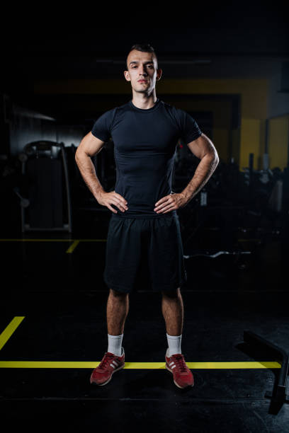 istock Male gym instructor portrait 1185112624