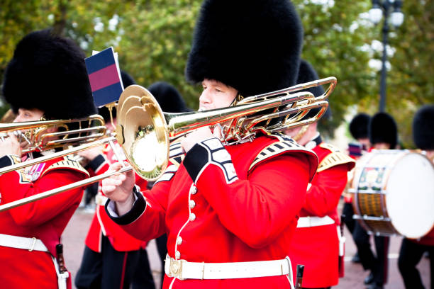 Soldiers of the Royal Guard London, United Kingdom - September 29, 2019: Soldiers of the Royal Guard leave the Buckingham Palace during changing the guard ceremony. monumento comemorativo stock pictures, royalty-free photos & images