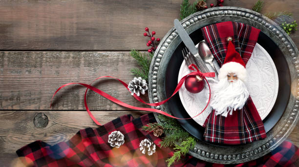 istock Christmas Dining Plate and Napkin on an Old Wood Table 1185119923