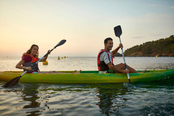 istock Spanish Friends Kayaking at Dawn Off the Costa Brava 1185119953
