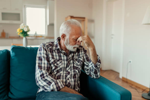 istock Senior Man Suffering From a Migraine 1185122079