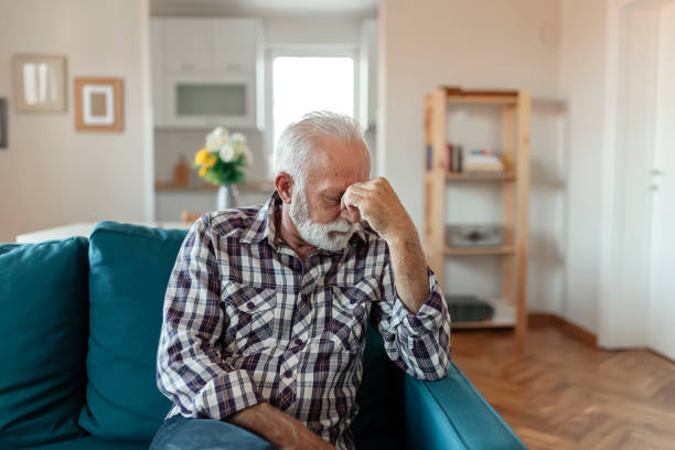 istock Senior Man Suffering From a Migraine 1185122080