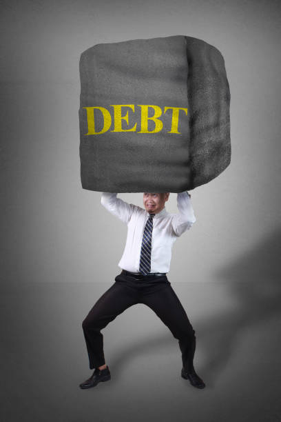 istock Businessman Under Big Debt Pressure 1185132170